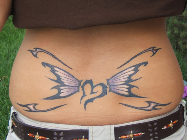 Tetovanie motýľa na srdci