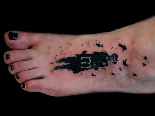 Fascinant tatuaj pentru picioare
